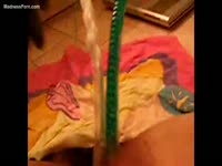 Fat ugly whore likes stimulating her clitoris and anus at the same time